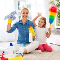 Mother and Daughter Cleaning Child's Room