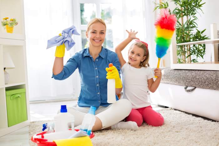 Mother and Daughter Cleaning Child's Room